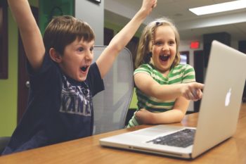 kids playing laptop