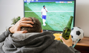 a man watching football